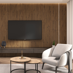 Solid oak wood acoustic panels on a living room tv wall. A wall-mounted dark console table on the wall and a round coffee table set with a light chair in the front.