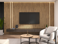 Solid oak wood acoustic panels on a living room tv wall. A wall-mounted dark console table on the wall and a round coffee table set with a light chair in the front.