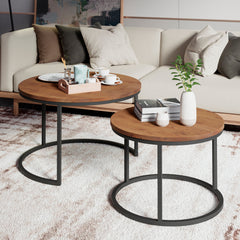 The Rukilill coffee table set styled with books, a flower and coffee mugs for a cozy living room setting