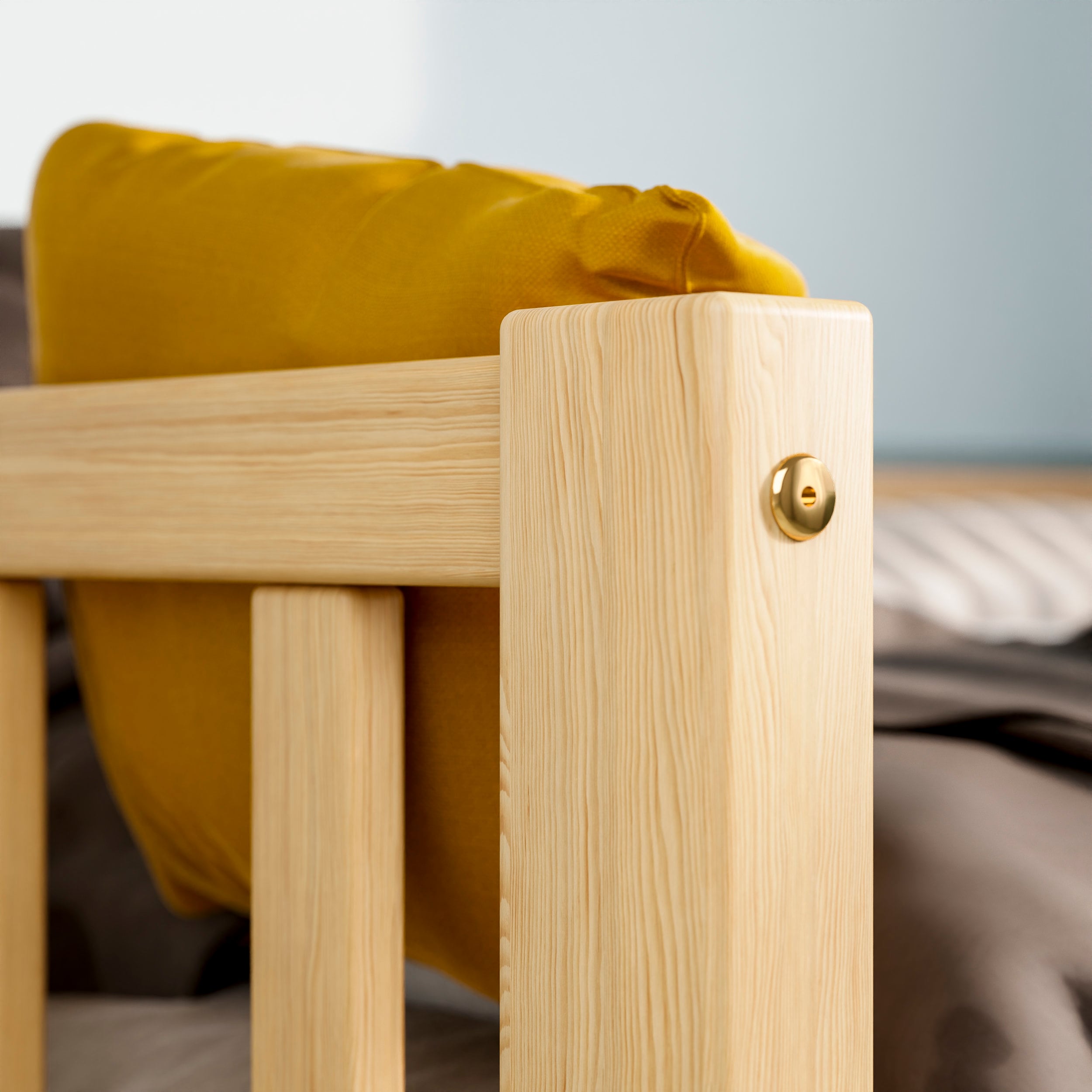 Close up view of the wooden kids bed with barriers highlighting the solid wood grain and attachments