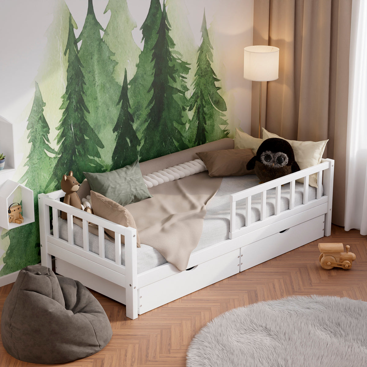 White wooden toddler bed VARBLANE with barriers, drawers and a pull-out bed in a modern kids room decorated with pillows and toys