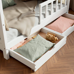 Close up view of the housebed showing the drawers opened up